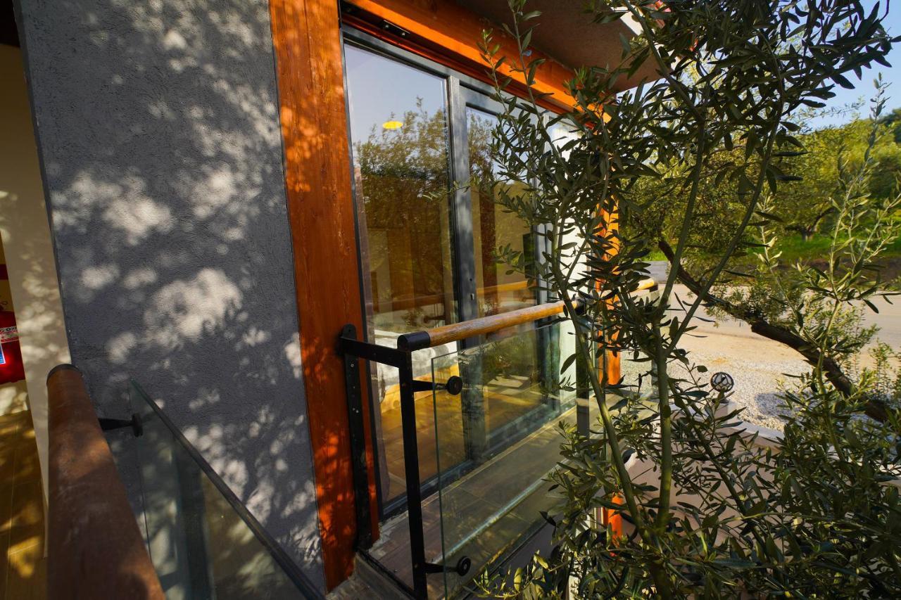 Qcunda Otel Ayvalı المظهر الخارجي الصورة
