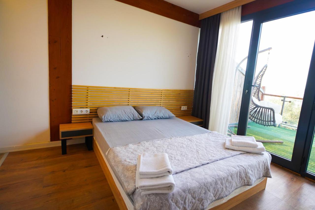 Qcunda Otel Ayvalı المظهر الخارجي الصورة