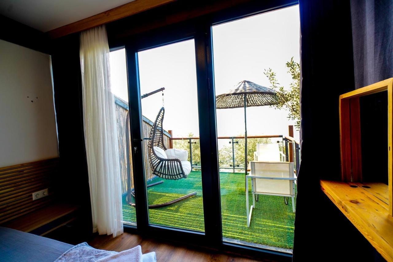 Qcunda Otel Ayvalı المظهر الخارجي الصورة