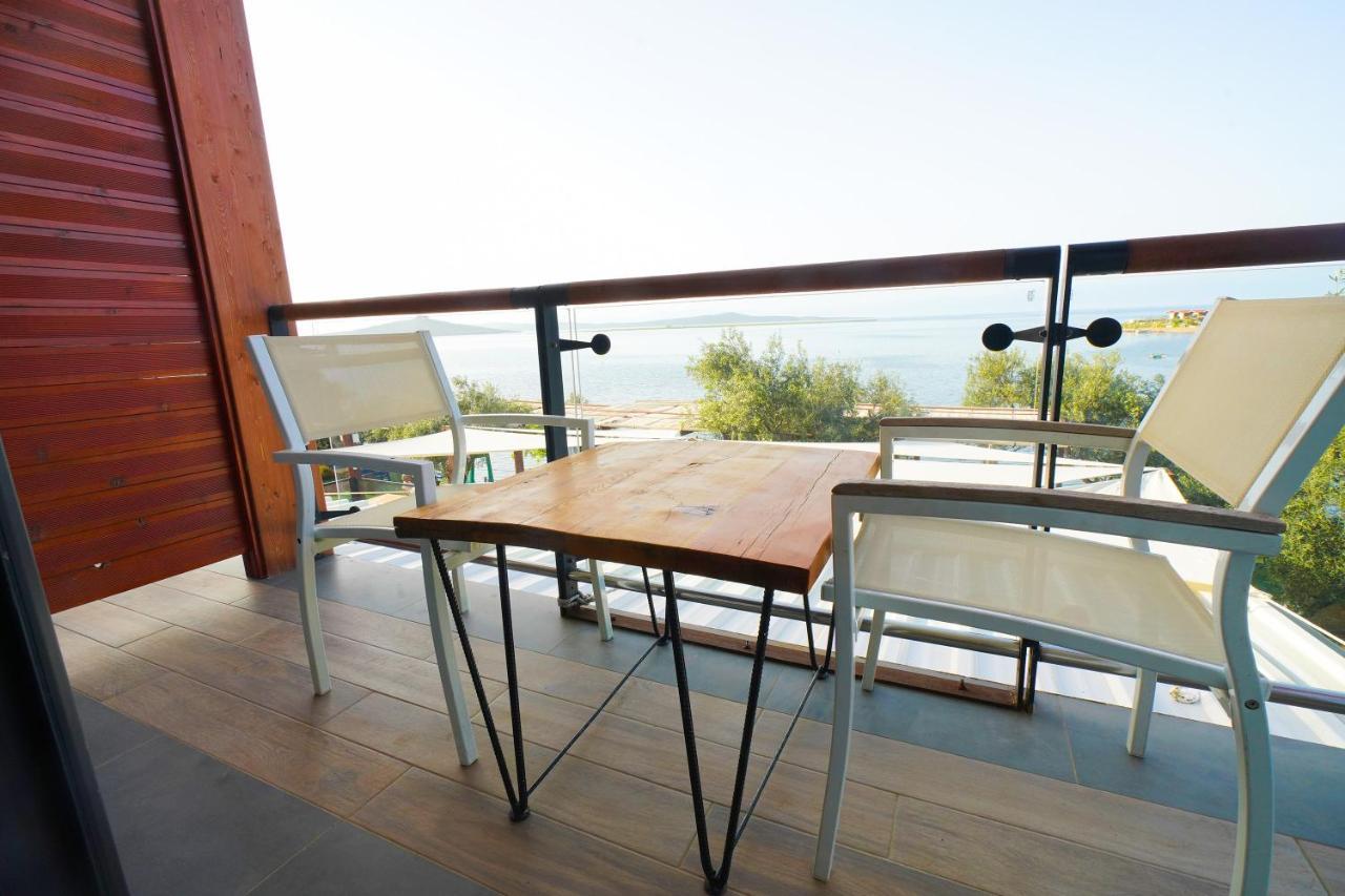 Qcunda Otel Ayvalı المظهر الخارجي الصورة