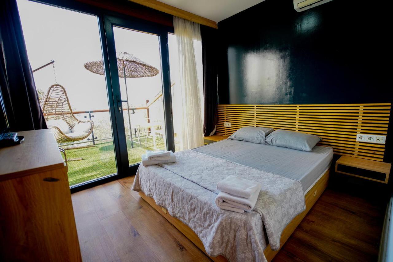Qcunda Otel Ayvalı المظهر الخارجي الصورة