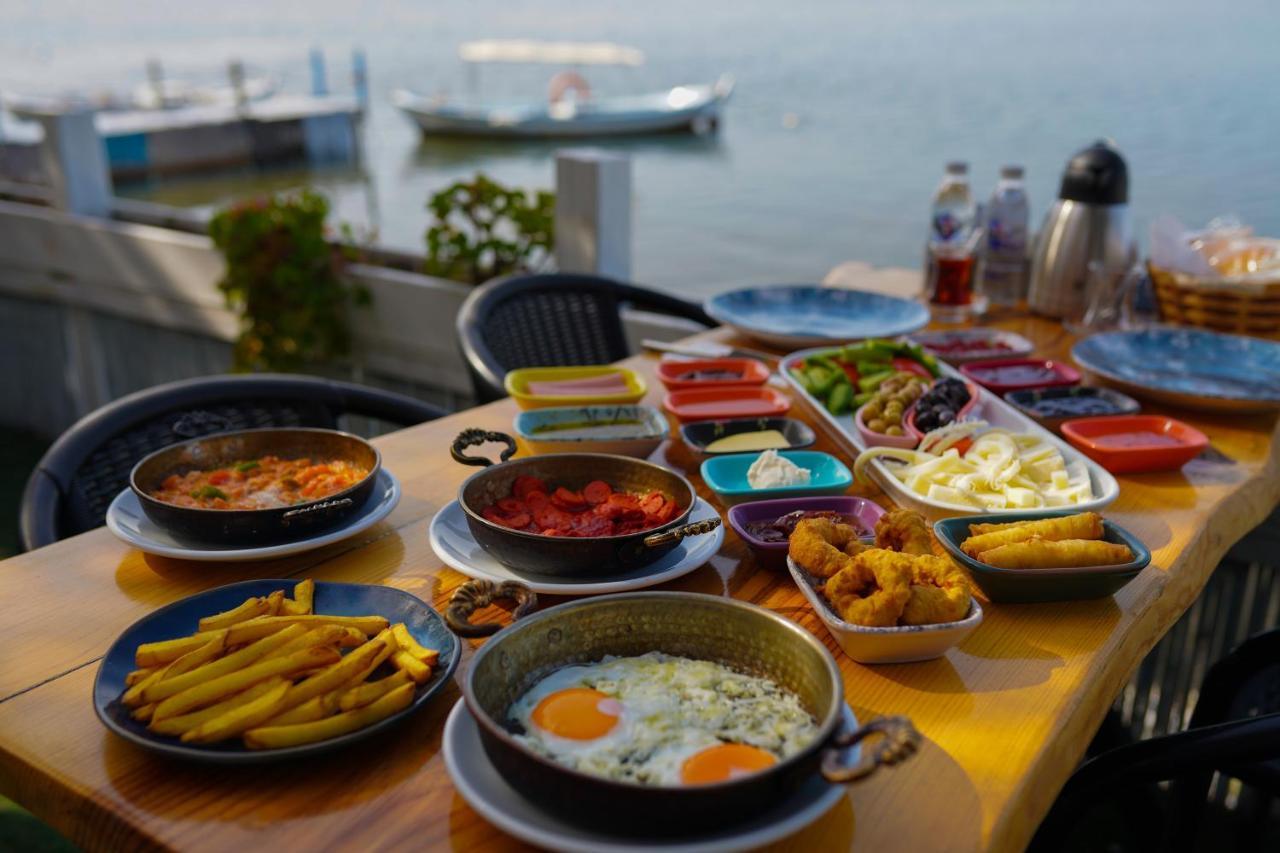 Qcunda Otel Ayvalı المظهر الخارجي الصورة