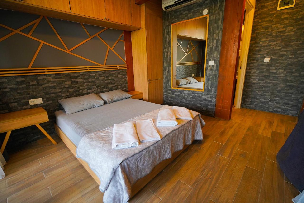 Qcunda Otel Ayvalı المظهر الخارجي الصورة