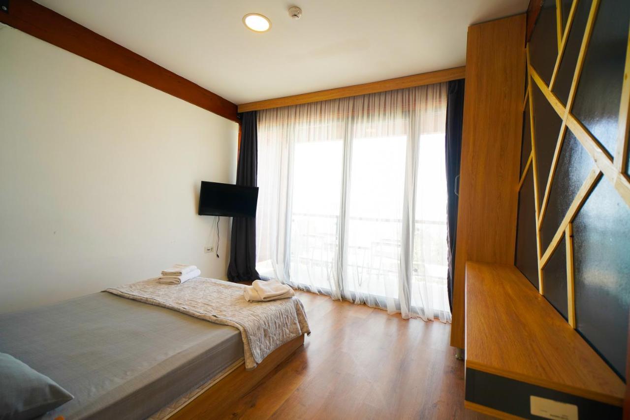 Qcunda Otel Ayvalı المظهر الخارجي الصورة