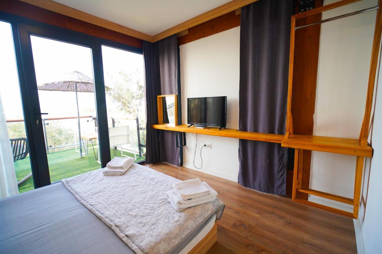 Qcunda Otel Ayvalı المظهر الخارجي الصورة