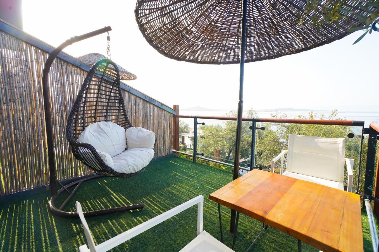 Qcunda Otel Ayvalı المظهر الخارجي الصورة