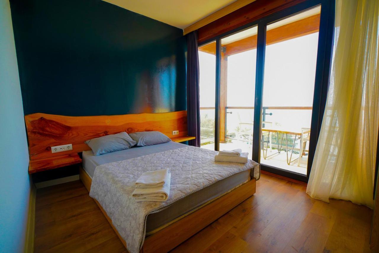 Qcunda Otel Ayvalı المظهر الخارجي الصورة